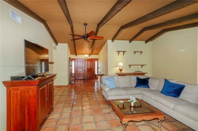 living room with vaulted ceiling with beams, ceiling fan, light tile patterned floors, and wood ceiling