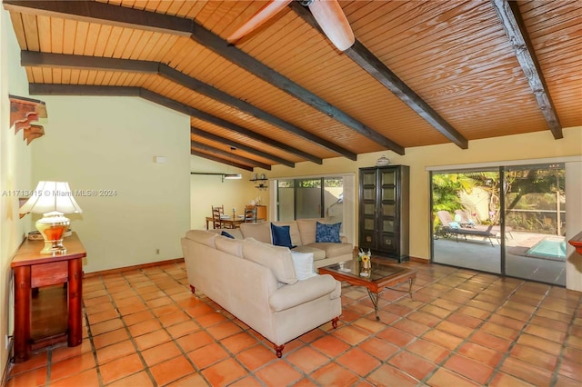 living room with wooden ceiling, tile patterned flooring, and lofted ceiling with beams