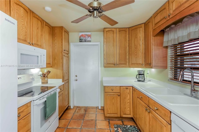 kitchen with ceiling fan, sink, and white appliances