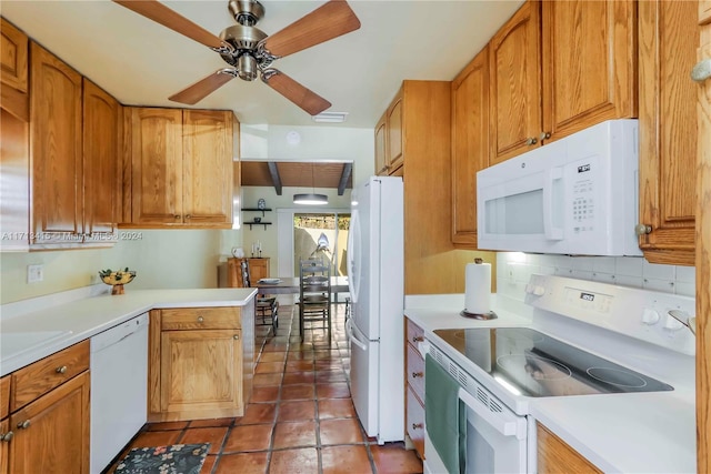 kitchen featuring ceiling fan, dark tile patterned floors, decorative backsplash, and white appliances