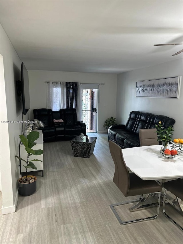 living area with wood finished floors