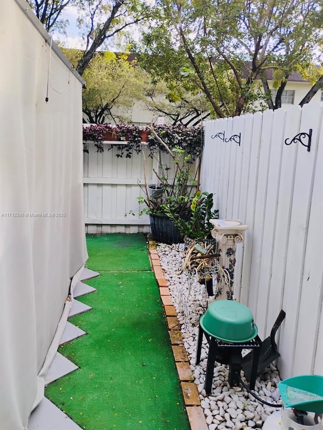 view of yard with fence