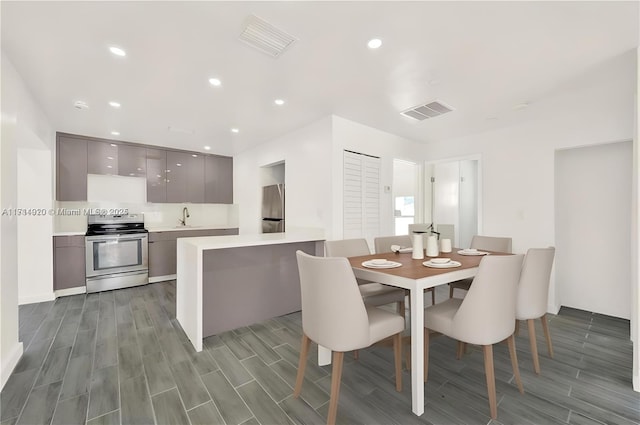 dining space with sink