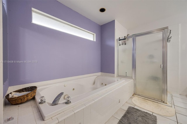 bathroom featuring separate shower and tub and tile patterned floors