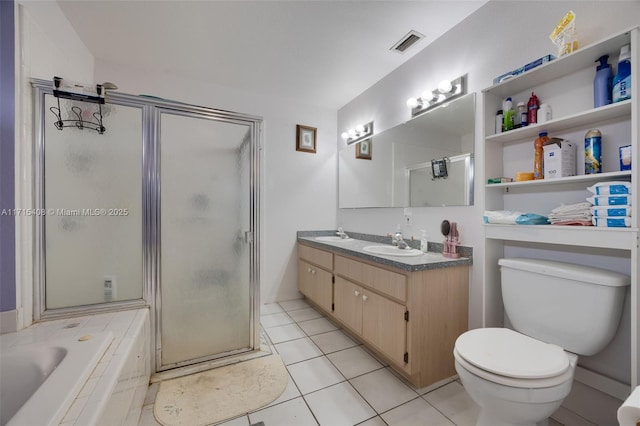 full bathroom featuring vanity, toilet, independent shower and bath, and tile patterned flooring