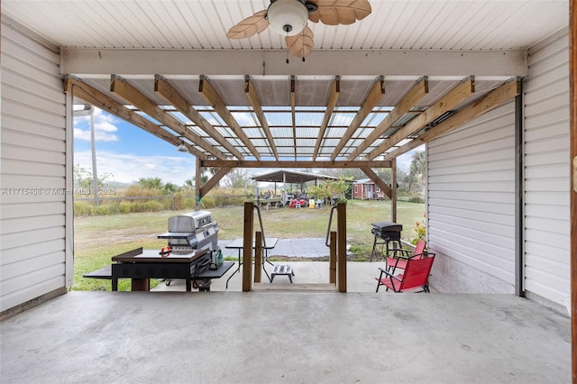 view of patio / terrace with area for grilling and ceiling fan