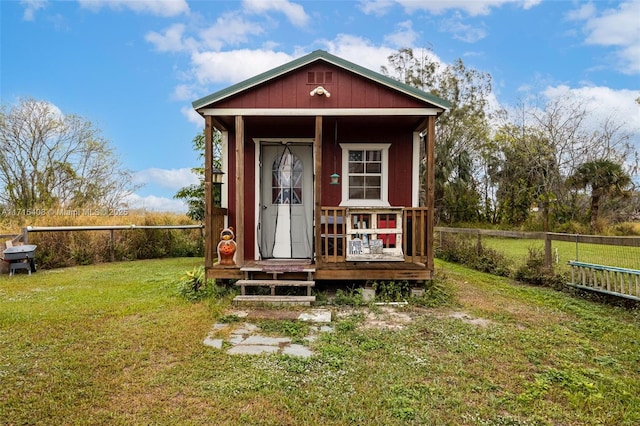 view of outdoor structure featuring a yard