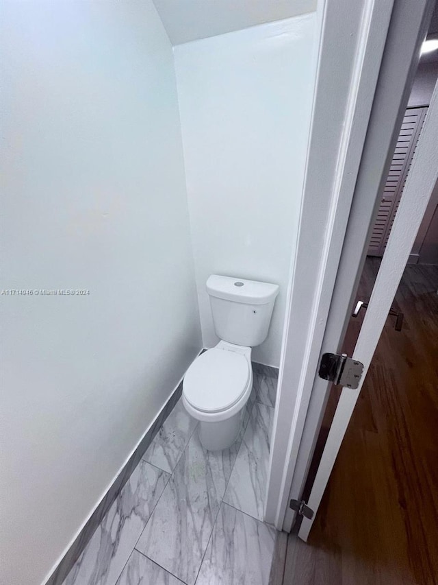 bathroom featuring toilet