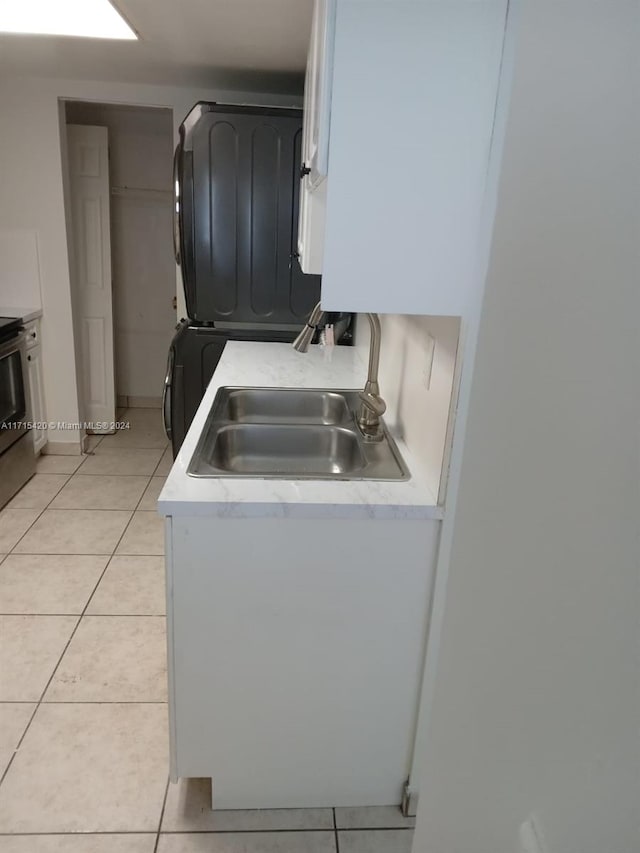 kitchen with stove and light tile patterned floors