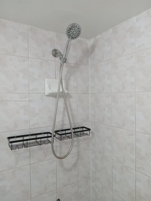 details with a tile shower