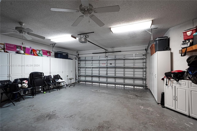 garage featuring a garage door opener and ceiling fan