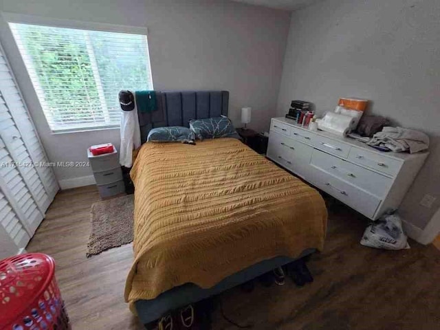 bedroom featuring hardwood / wood-style floors