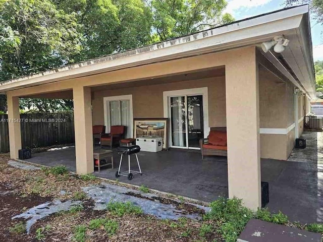 back of house featuring a patio