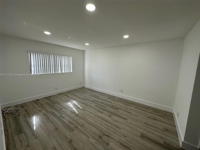 empty room featuring hardwood / wood-style floors