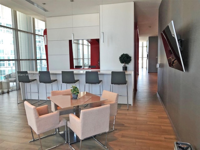 dining area featuring hardwood / wood-style flooring