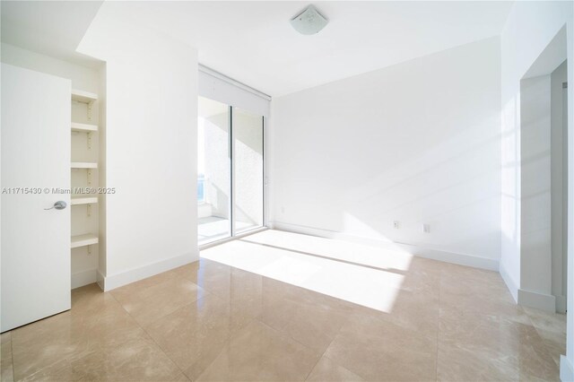 full bathroom with toilet, tile patterned flooring, shower / tub combo, and vanity