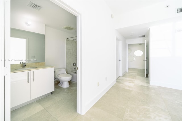 bathroom with toilet, shower / tub combination, and visible vents