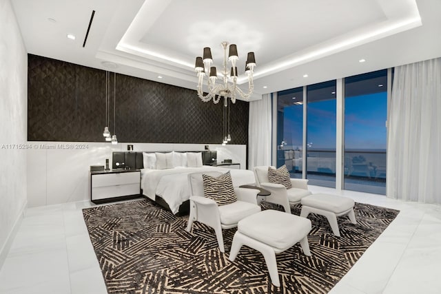 bedroom with tile patterned floors, a raised ceiling, and an inviting chandelier