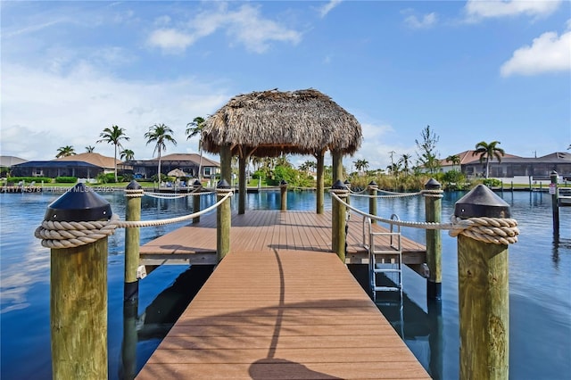 dock area featuring a gazebo and a water view