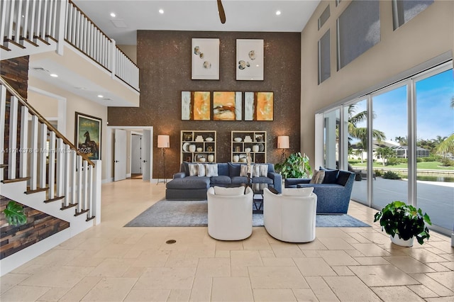 living room featuring a high ceiling