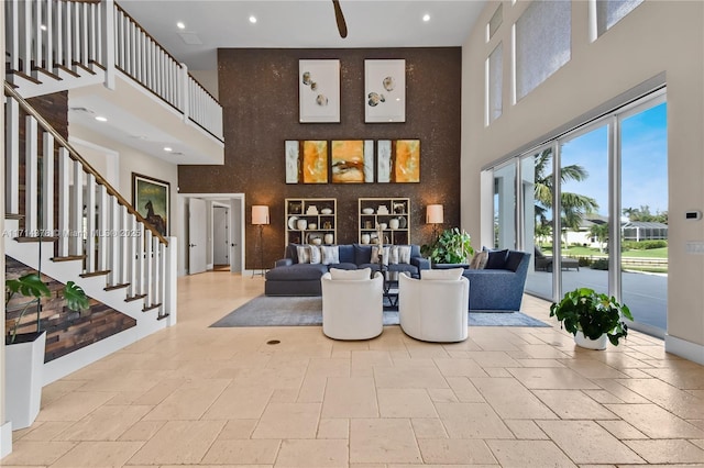 living room with a towering ceiling