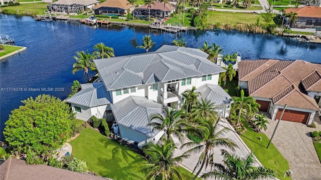 birds eye view of property featuring a water view