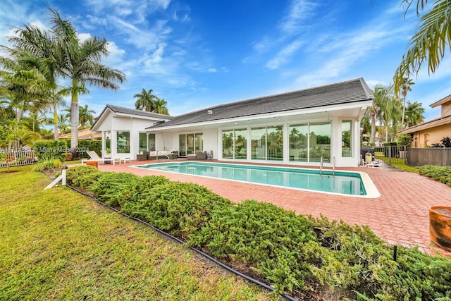 view of swimming pool with a patio