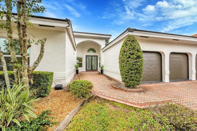 entrance to property featuring a garage