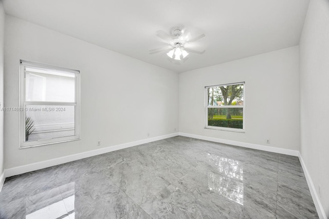 spare room featuring ceiling fan