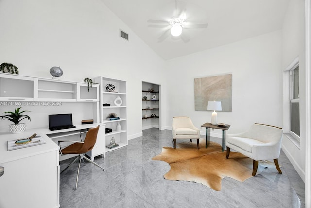 home office with ceiling fan and high vaulted ceiling