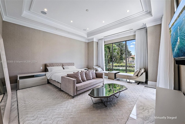 bedroom featuring a raised ceiling and ornamental molding