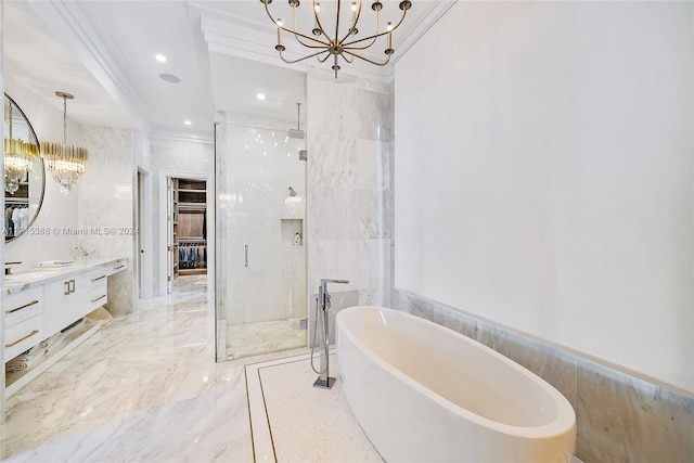 bathroom with plus walk in shower, a notable chandelier, vanity, tile walls, and ornamental molding