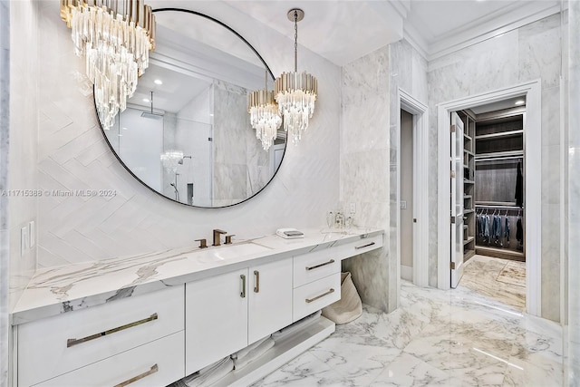 bathroom featuring a chandelier and vanity