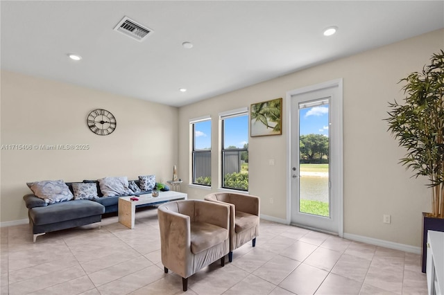 living room featuring light tile patterned flooring