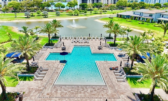 view of pool with a water view