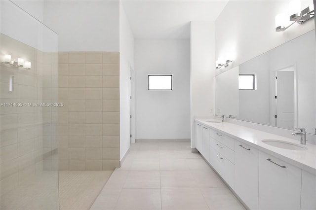 bathroom featuring tile patterned floors and vanity