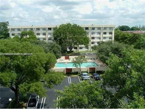 exterior space featuring a community pool