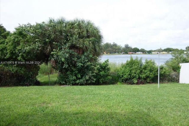 view of yard with a water view