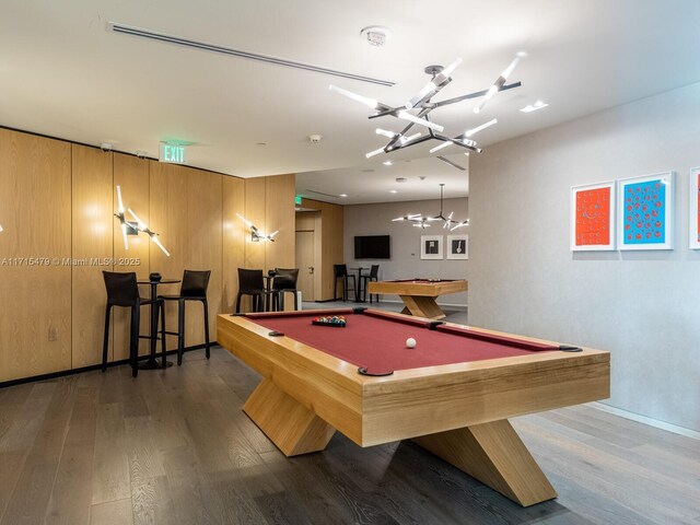 rec room with light hardwood / wood-style flooring and billiards