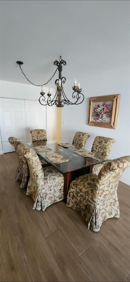 dining room with dark wood-type flooring