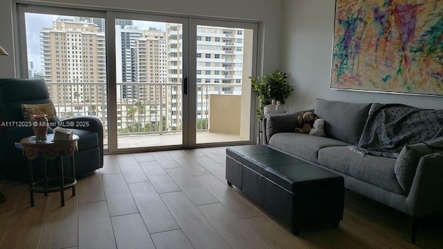 living area featuring light wood-style floors and a view of city