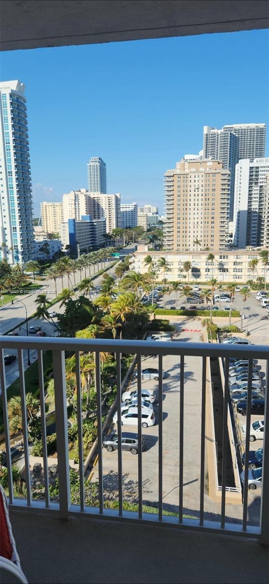 balcony featuring a city view