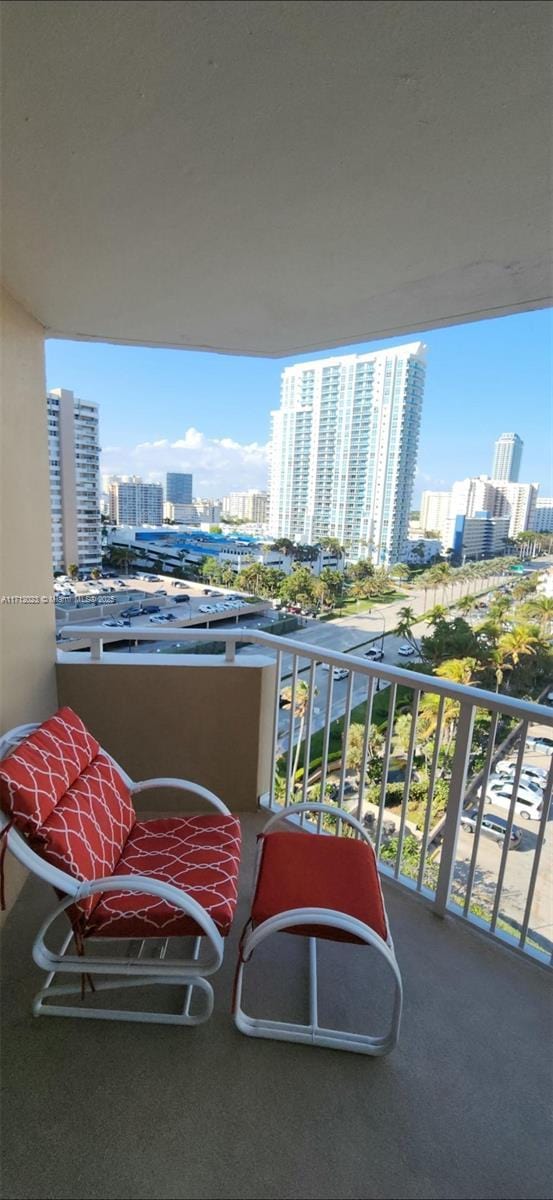 balcony featuring a view of city