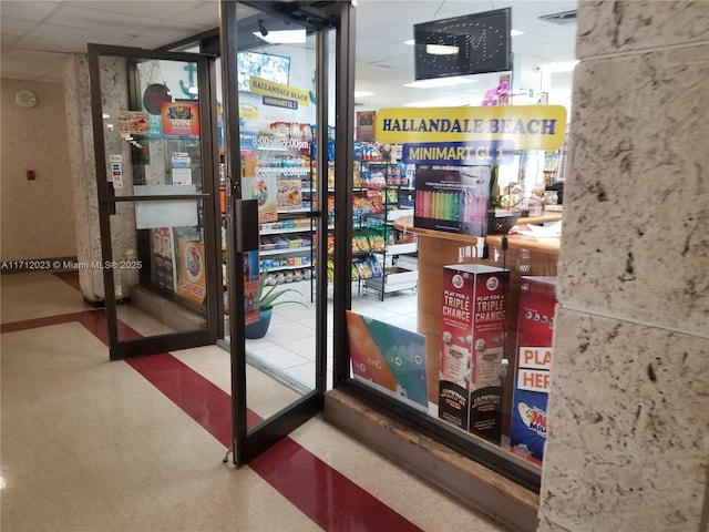 1980 S Ocean Dr Unit 9M, Hallandale Beach, FL 33009 - doorway to outside featuring a drop ceiling