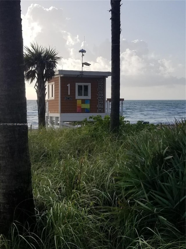 exterior space with a water view