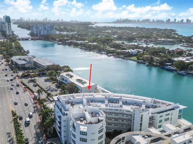bird's eye view with a water view and a view of city