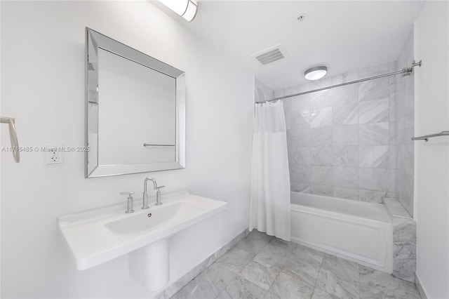 bathroom with shower / tub combo with curtain, visible vents, marble finish floor, and baseboards