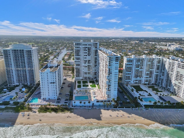 aerial view with a beach view and a water view