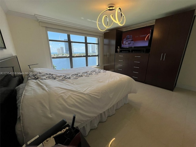 bedroom featuring crown molding