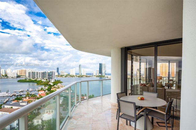 balcony featuring a water view